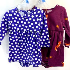 2 Little girls 3-6months dress sets.